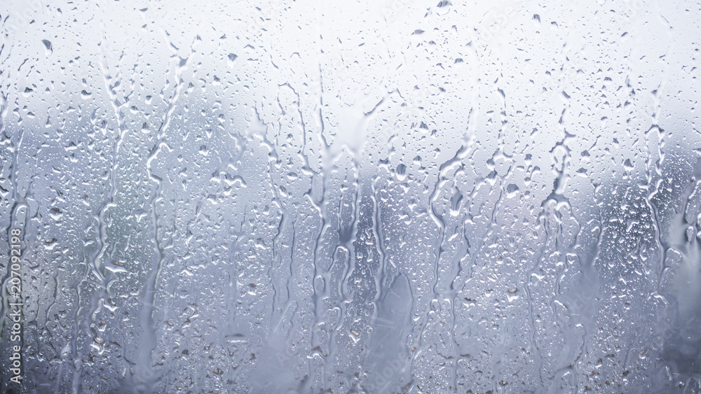 rainy days, rain drops on the window surface 