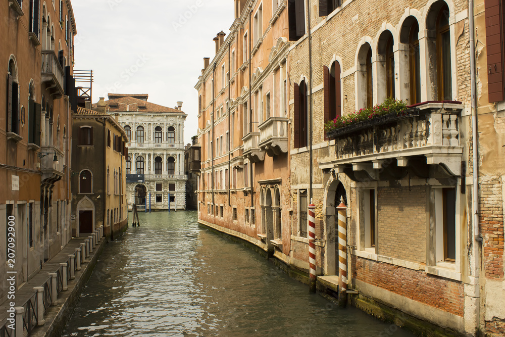 Buildings, houses along canal in Venice, Italy