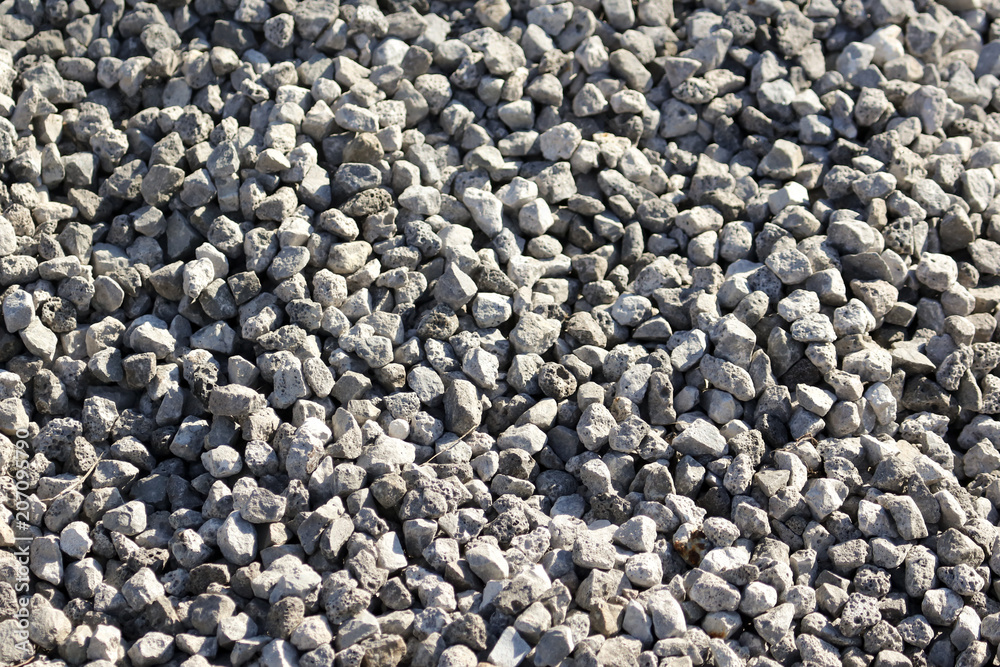 Stone crushed stone on the construction site as an abstract background Stone crushed stone on the construction site as an abstract background