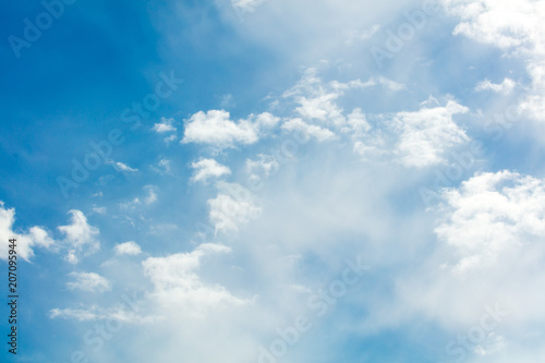 Clouds on a blue sky as a background