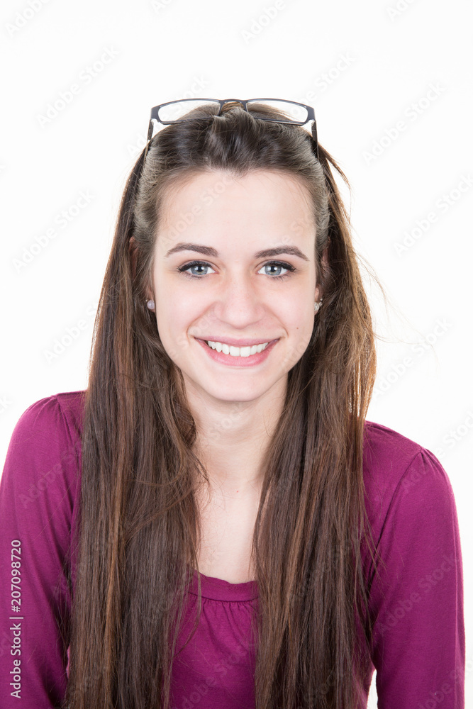 Headshot of cute brunette woman professional businesswoman with glasses on head Headshot of cute brunette woman professional businesswoman with glasses on head