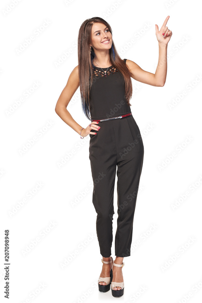 Happy business woman pointing to the side at blank copy space, full length portrait, over white background Happy business woman pointing to the side at blank copy space, full length portrait, over white background