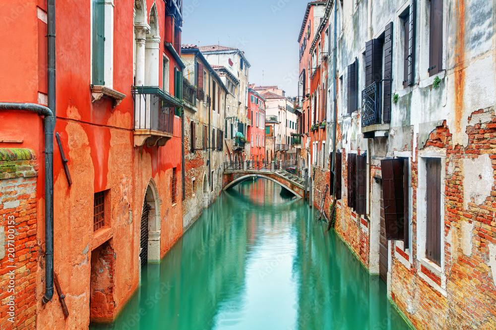 Venice landmark, canal, colorful houses and boats, Italy