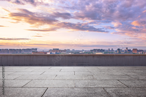 cityscape of modern city from empty asphalt road