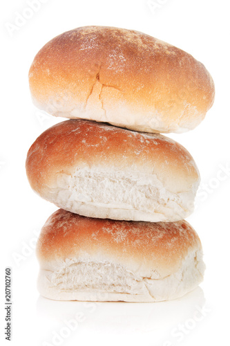 A stack of breakfast rolls isolated on a white background