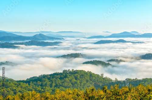 Landscape under morning fog covered the valley like clouds floating in wonderful idyllic highlands of Dalat  Vietnam
