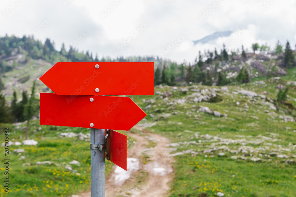 Red Blank Signpost in the Mountains Red Blank Signpost in the Mountains