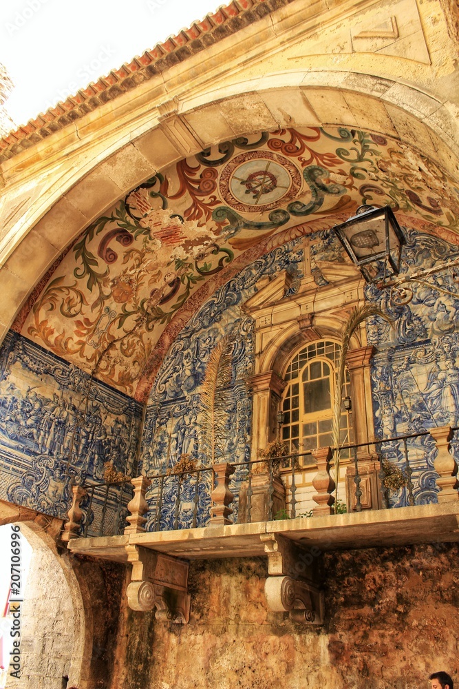 Old painted and tiled facade in Obidos