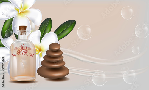Spa essential oil bottle with plumeria flower  zen stones