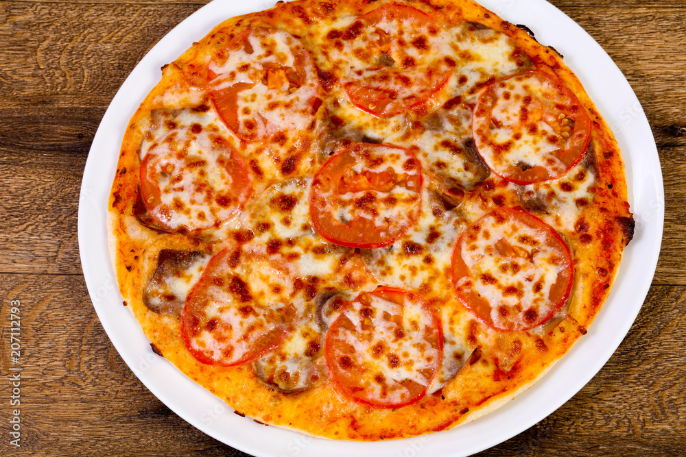 Pizza with beef and tomato Pizza with beef and tomato