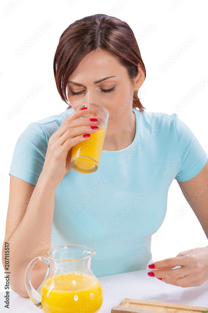 female drinking juice from glass isolated close up female drinking juice from glass isolated close up