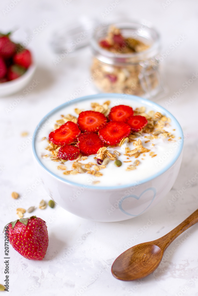 Granola with yogurt and strawberry, healthy breakfast Granola with yogurt and strawberry, healthy breakfast