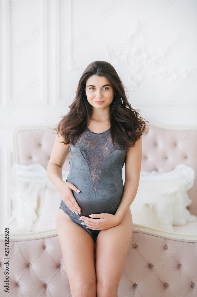 Pregnant girl in anticipation of a child, beautiful pregnant girl Pregnant girl in anticipation of a child, beautiful pregnant girl