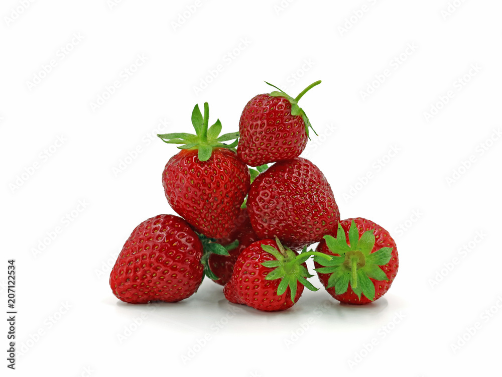 Close up of fresh strawberries shaped to a pyramid isolated on white background Close up of fresh strawberries shaped to a pyramid isolated on white background