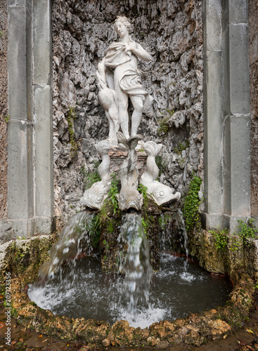 The “Leda e il cigno” statue, with fountain to the base, in a niche at Villa Reale in Marlia, Lucca, Italy.