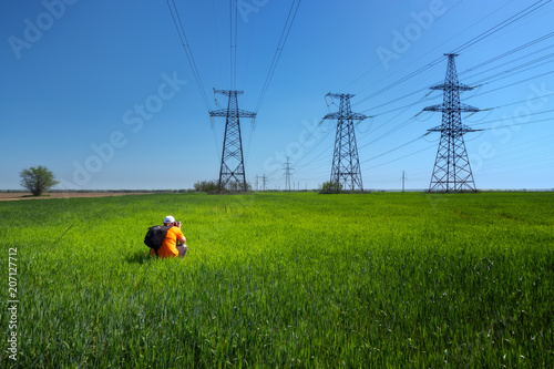 Wallpaper Mural power line summer landscape / passing overhead electricity wire of the support carrying the light and the heat in the house Torontodigital.ca