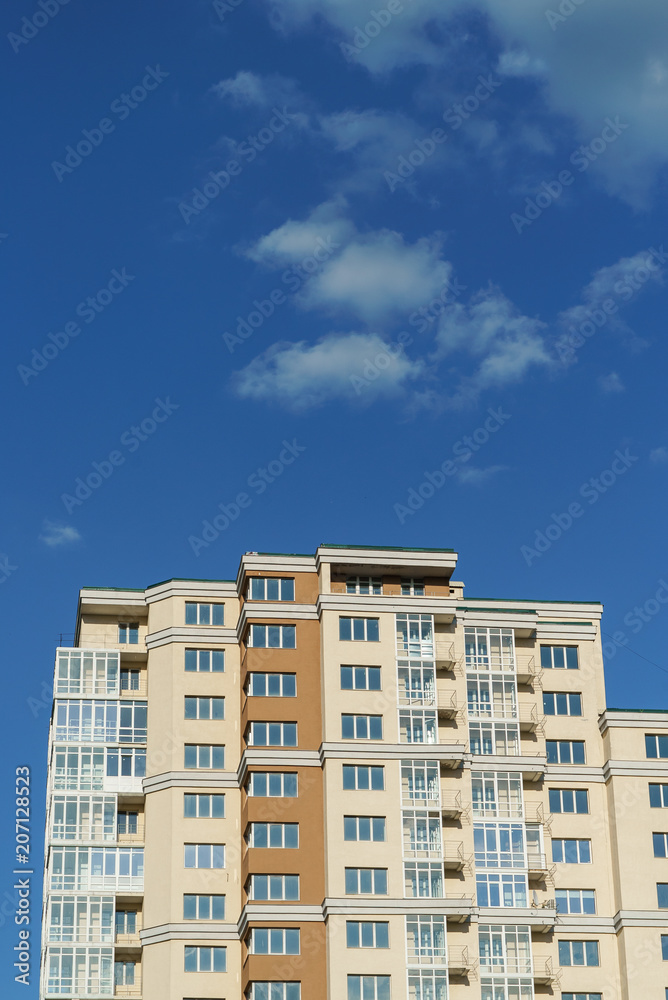 Multi-storey house and blue sky