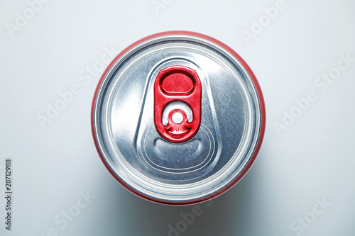 Metal cans with cooling drinks on a white background