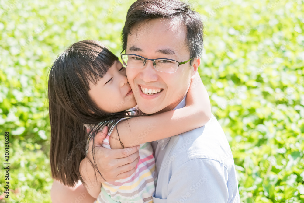 father and daughter smile happily father and daughter smile happily