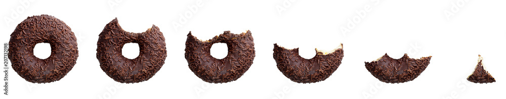 Eaten chocolate donut isolated on white background. Top view Eaten chocolate donut isolated on white background. Top view