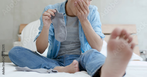Фотография man with smelly socks