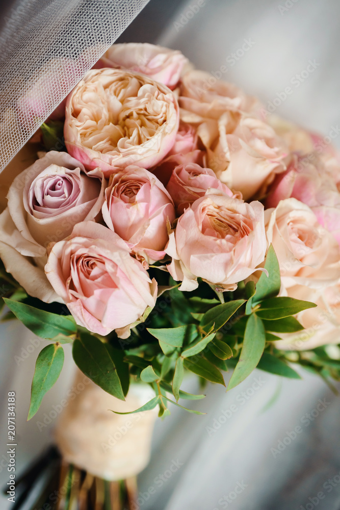 Stunning bridal bouquet. Wedding ceremony. Mix of peony, succulents, orchids and roses. Modern bridal accessories. Wedding flowers Stunning bridal bouquet. Wedding ceremony. Mix of peony, succulents, orchids and roses. Modern bridal accessories. Wedding flowers