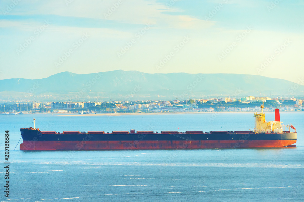 Fototapeta premium cargo shipping tanker Lisbon, Portugal