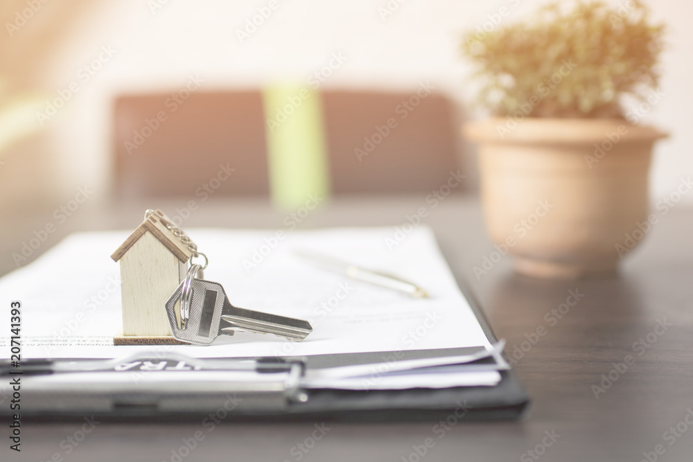 house key on contract paper preparing for owner on table house key on contract paper preparing for owner on table