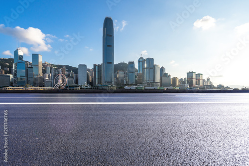 empty road with city skyline in hongkong china