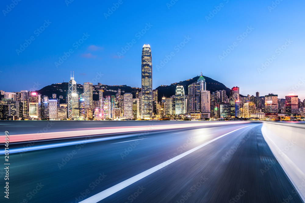 busy traffic with city skyline in hongkong