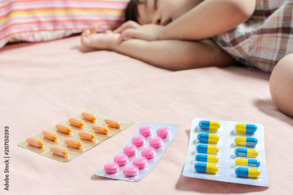 Little Asian Boy Sleep with Medicine panel in hand. Little Asian Boy Sleep with Medicine panel in hand.