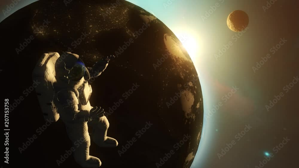 Astronaut in outer space against the backdrop of the planet earth. 