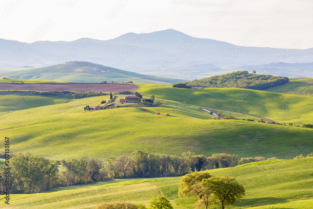 Rural landscape with mountains in the background