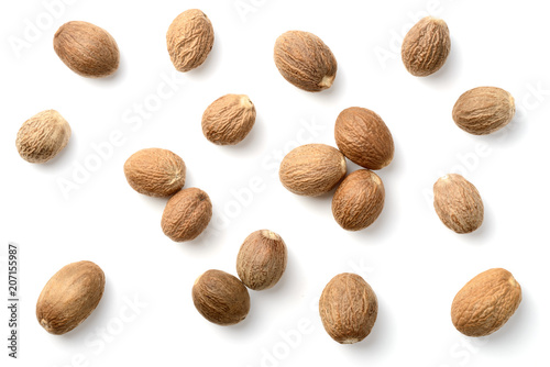 whole nutmeg isolated on white