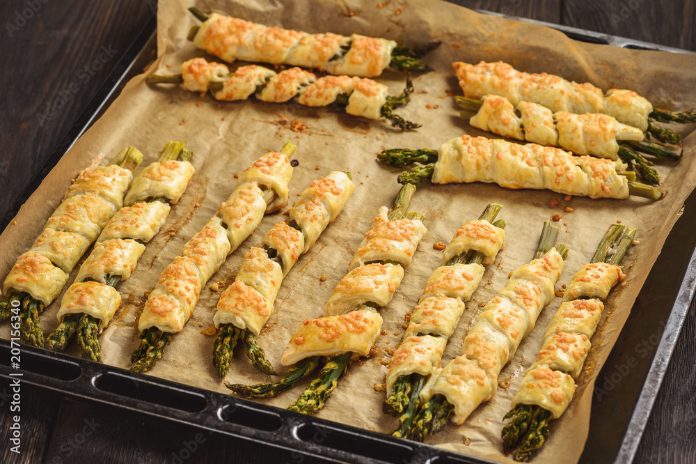 Asparagus baked in puff pastry with cheese.
