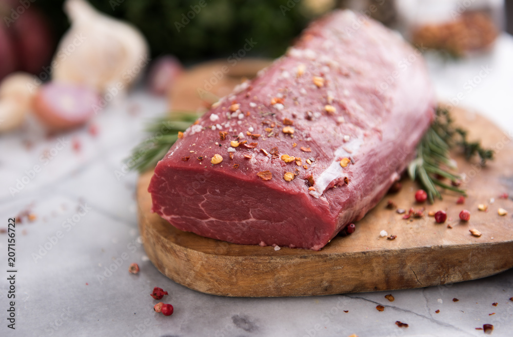 Beef Tenderloin on Wooden cutting Board