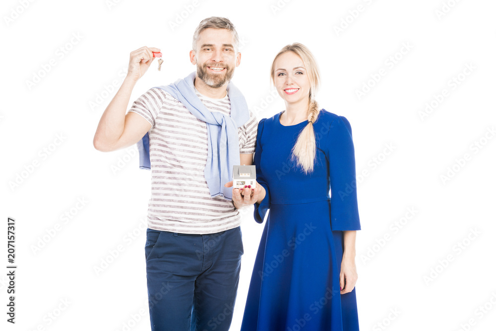 Portrait of young family moving in new home, isolated on white background Portrait of young family moving in new home, isolated on white background