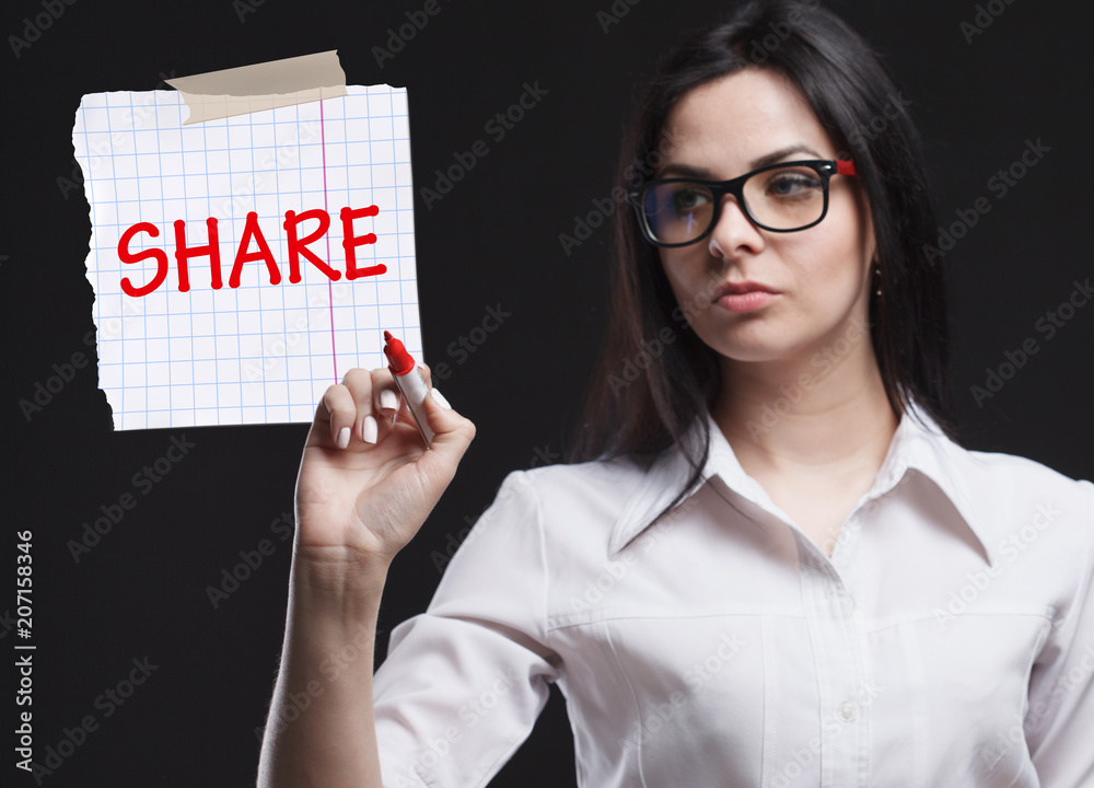 The concept of marketing, technology, the Internet and the network. A young businessman shows what is important for business: Share The concept of marketing, technology, the Internet and the network. A young businessman shows what is important for business: Share