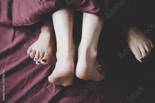 Tableau sur toile The couple or husband and wife have special time together by having sex or make love on a bed at bedroom