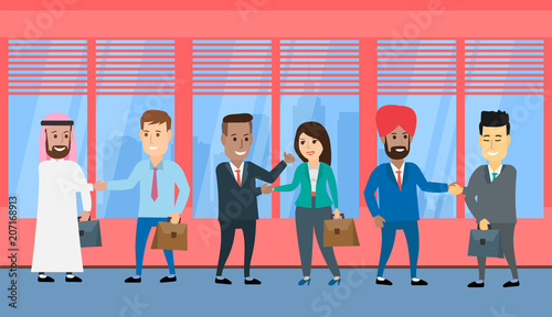international business people shaking hands in office