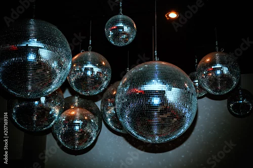 Fototapeta Disco balls in a nightclub room