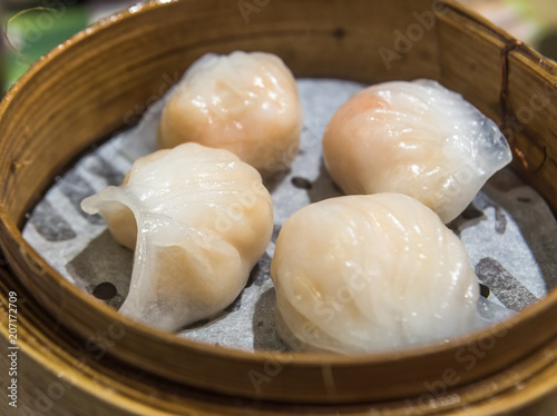 Dim Sum, traditional Cantonese dumplings, cooked in bamboo steamer
