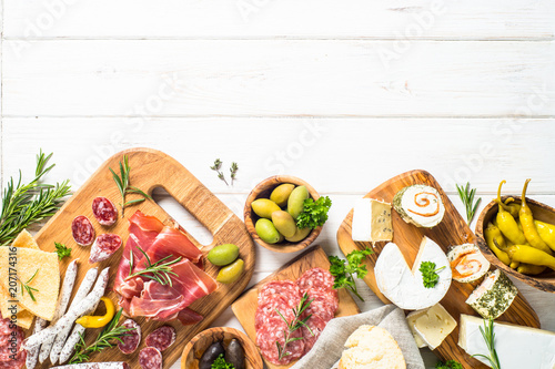 Obraz na płótnie Antipasto delicatessen - meat, cheese and olives.