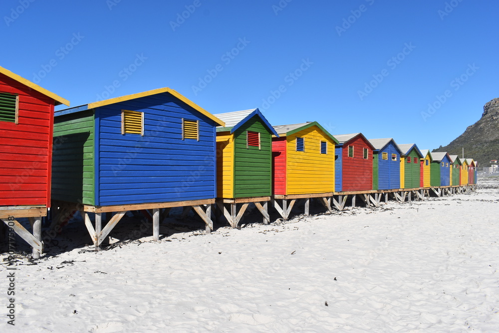 Colorful bathing cabins on the beach in Muizenberg in Cape Town, South Africa Colorful bathing cabins on the beach in Muizenberg in Cape Town, South Africa
