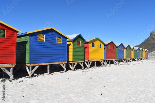 Colorful bathing cabins on the beach in Muizenberg in Cape Town, South Africa © places-4-you