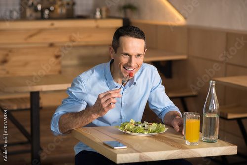 businessman eating fresh salad