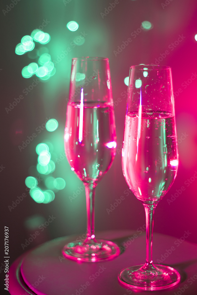 Champagne glass in disco party bar Champagne glass in disco party bar