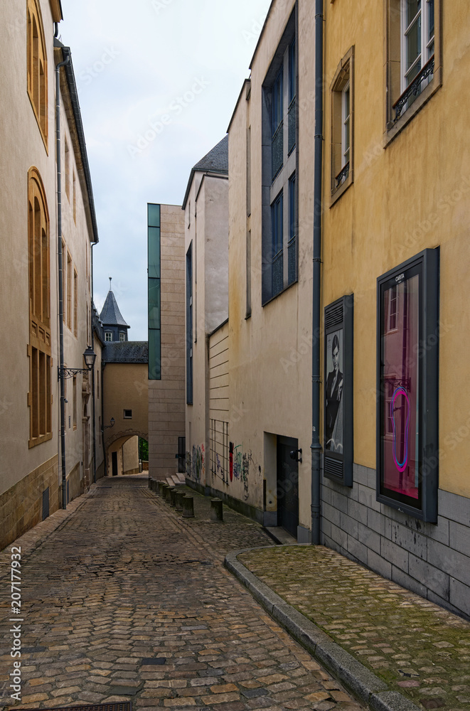 Luxembourg, Luxembourg-MAY 01, 2018: Traditional vintage houses in dark May morning. Spring urban landscape