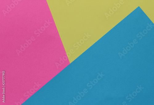Creative geometric paper background. Pink, blue, yellow colors. Abstraction. Template.