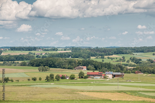 Little village in the middle of the german countryside with forests, fields and meadows